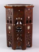A SMALL 19TH CENTURY INDIAN HARDWOOD OCTAGONAL TRAVELLING OCCASIONAL TABLE, the table inlaid with