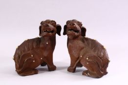 A GOOD PAIR OF CHINESE 19TH CENTURY TERRACOTTA FORMED LION DOG FIGURES, Modeled as male and