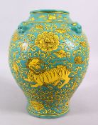 A CHINESE MING STYLE TURQUOISE GROUND PORCELAIN KYLIN VASE, decorated with a turquoise ground with