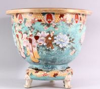 A LARGE 20TH CENTURY SATSUMA JARDINIERE AND STAND, painted with figures in a landscape (AF), overall