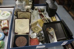 A box of miscellaneous collectables.