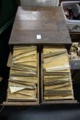 A four drawer index chest containing numerous stamps, together with a box of stamps and other