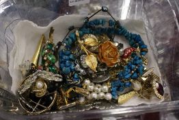A box of costume jewellery.