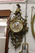A large decorative rococo style wall clock.