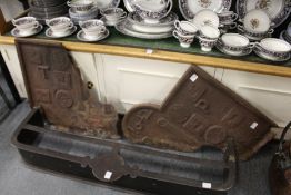 An early cast iron fire back (in two parts), dated 1642.