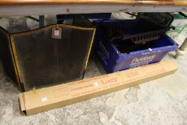 A spark guard, a projection screen, cast iron items.