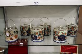 Six Imari style porcelain biscuit barrels with plated mounts.