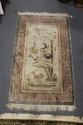 A small Chinese rug.