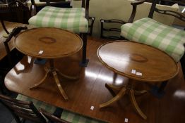 A pair of Sheraton revival mahogany oval tripod occasional tables.