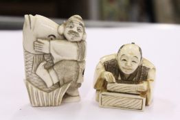 Two Chinese carved ivory netsukes.