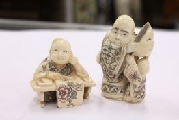 Two Chinese carved ivory netsukes.