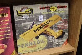 A boxed limited edition diecast advertising aeroplane.