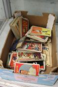 A box of assorted collector's cards.