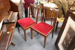 A set of eight mahogany dining chairs, two with arms.