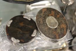 A Georgian tortoiseshell and silver oval snuff box and a silver and tortoiseshell folding magnifying