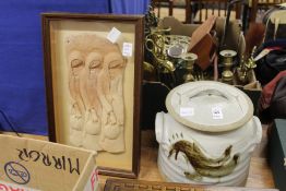 Studio pottery jar and cover together with a terracotta figural plaque, framed and glazed.