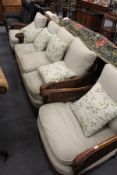 A good mahogany framed Bergere three piece suite, single caned, comprising three seater settee and a