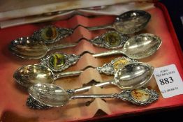 A set of six decorative spoons.