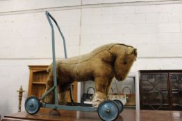 An early push along toy model as a horse.