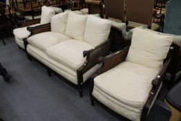 A very good Bergere three piece suite, double caned, comprising a large two seater settee and a pair