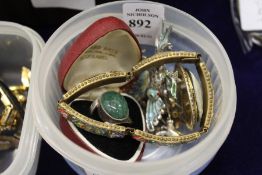 A decorative ring and costume jewellery.