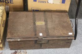 A black japanned tin trunk with engraved name plate.