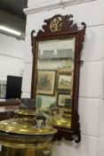 A Georgian style mahogany fretwork framed wall mirror.