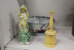 A small Imari bowl and two other items.