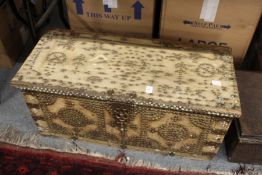 An eastern brass studded hardwood coffer.