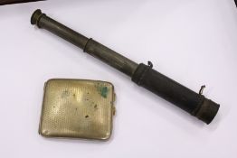 A small telescope and a cigarette case.