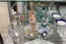 An unusual Murano glass fish shaped vase and four flower baskets.