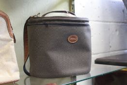 A ladies' vanity case. Stamped Longchamps.