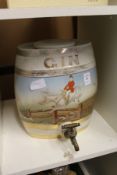 A gin barrel decorated with a hunting scene.