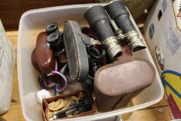 Binoculars, cameras and a small microscope.