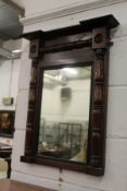 A 19th century mahogany pier mirror with split baluster columns.