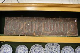 An Arts and Crafts copper double sided sign.