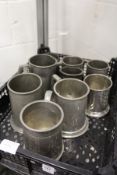 Pewter tankards.