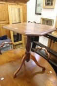 A mahogany tripod occasional table.