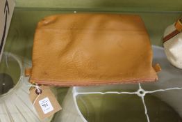 A leather bag and spectacle case.