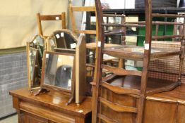 A mahogany armchair (AF) and two dressing table mirrors.