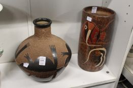 Two African art pottery vases.