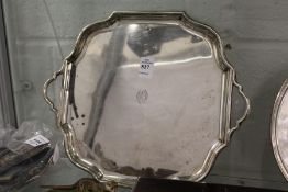 A silver twin handled square shaped salver with pie crust border, Sheffield 1901, 26ozs.