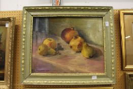 A still life of fruit on a ledge, oil on canvas, signed and dated 1972.