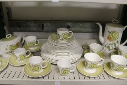 A quantity of Susie Cooper or Wedgwood Sunflower pattern china.