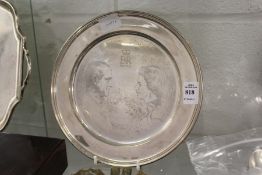 An engraved silver circular plate commemorating the 25th Wedding Anniversary of Their Royal