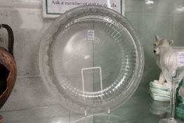 A Lalique circular bowl with moulded floral decoration.