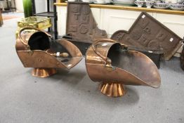 Two good copper coal scuttles and a coal scoop.