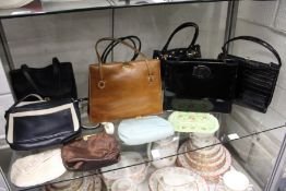 Various ladies' handbags and evening purses.