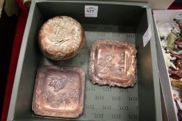 A Japanese tinned copper box and cover and two similar small dishes.
