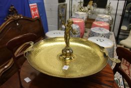 A brass centrepiece with figural mount.